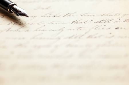 41808591 - fountain pen on an antique handwritten letter